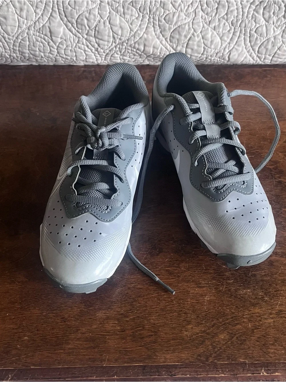 Nike Gray Youth Cleats with White Swoosh